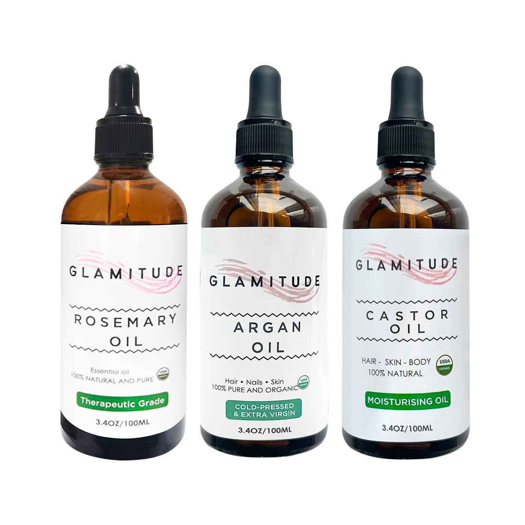 Three bottles of Glamitude oils with labels for Rosemary, Argan, and Castor on a white background.